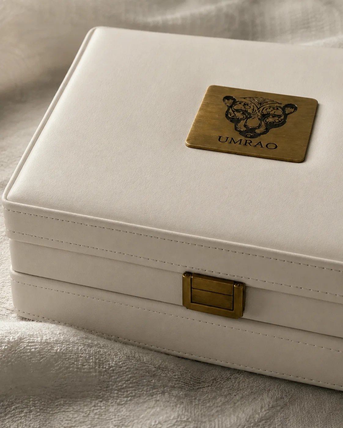 An ivory Umrao coffret resting on linen